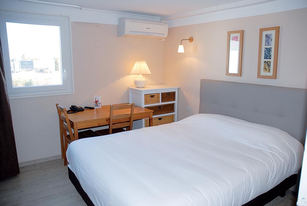 Contact Hotel Le Sud Montpellier Aeroport Parc Expo Arena モーギオ エクステリア 写真